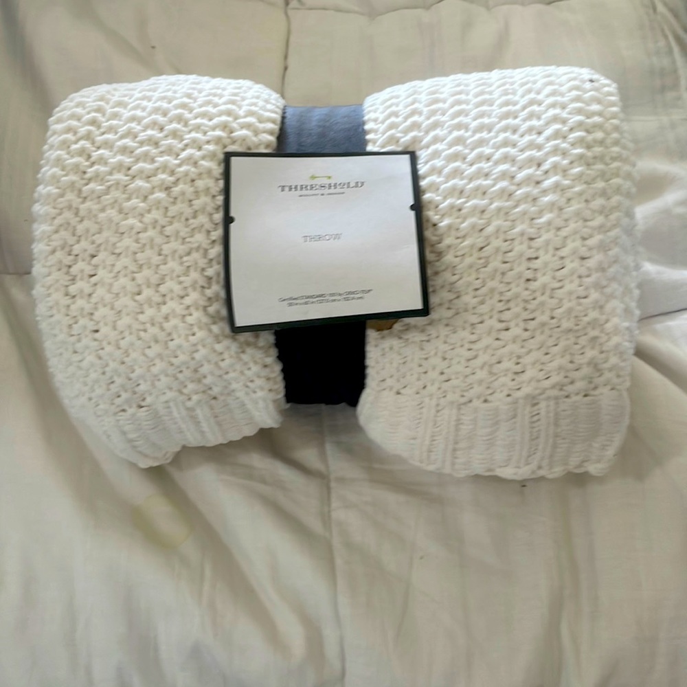 Ivory throw. NWT.